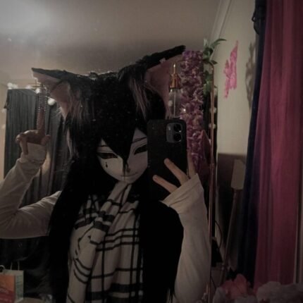 Customer photo of Elena wearing a handmade black kigurumi kemono mask